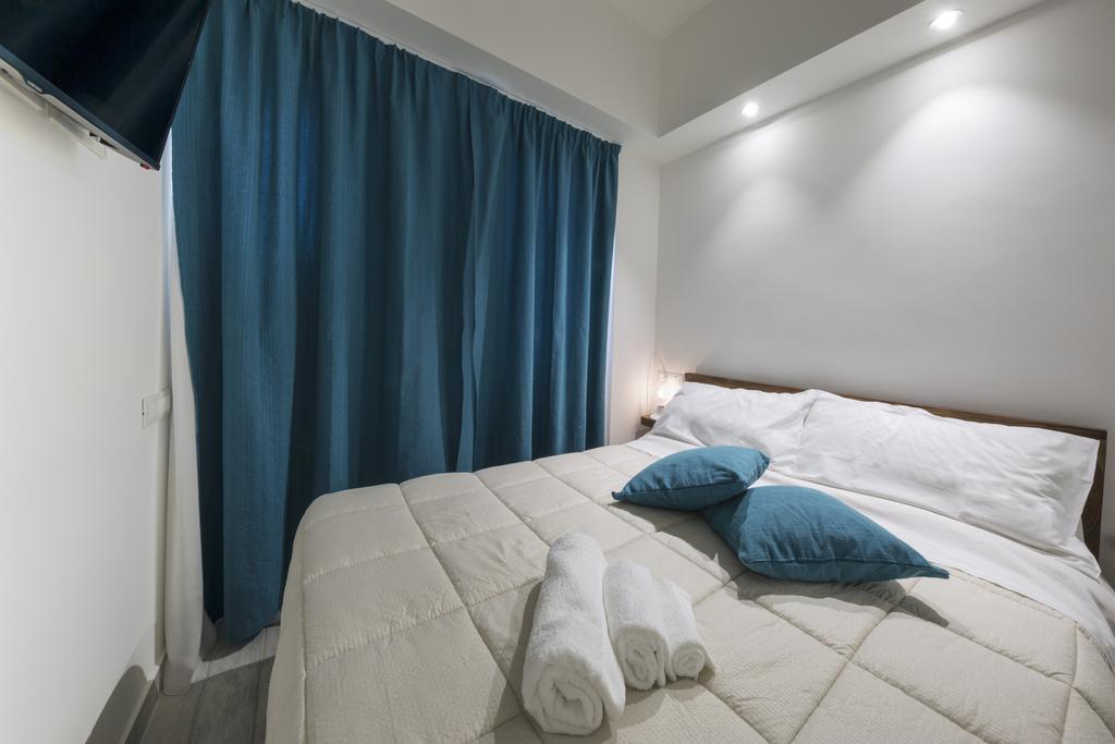 Piazza Martiri Rooms Κάλιαρι Δωμάτιο φωτογραφία